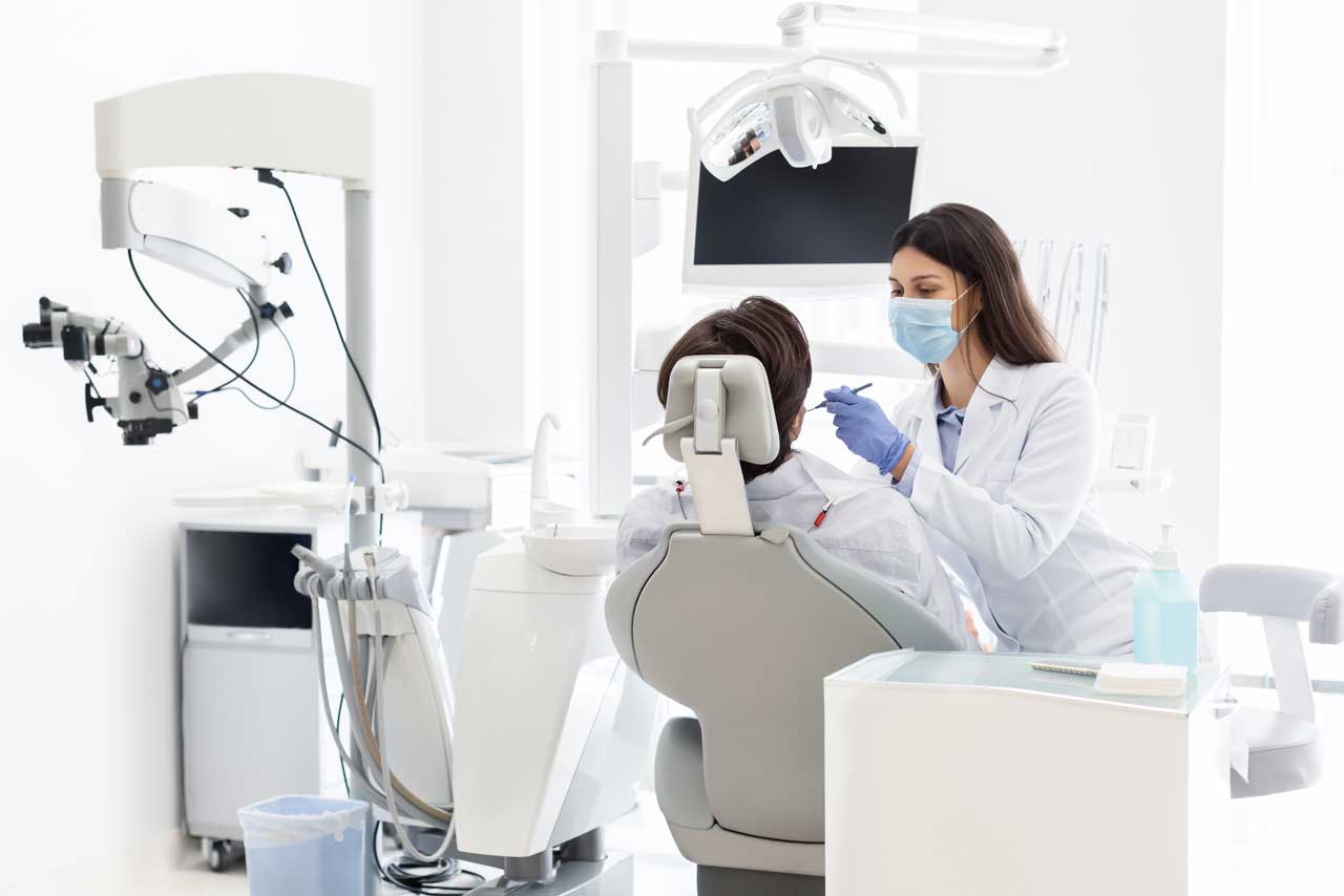 male patient undergoing scaling and polishing treatment at NoFrills Dental