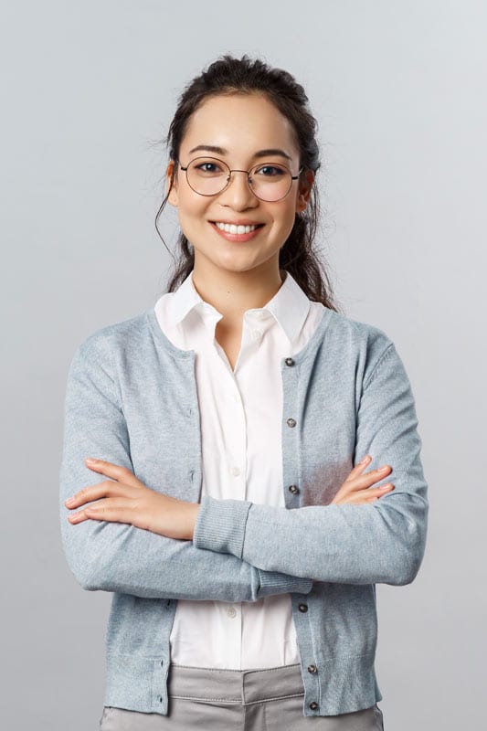 career-business-and-education-concept-portrait-of--5KE48EU Lady wearing her retainers after completing her Invisalign treatment in Singapore