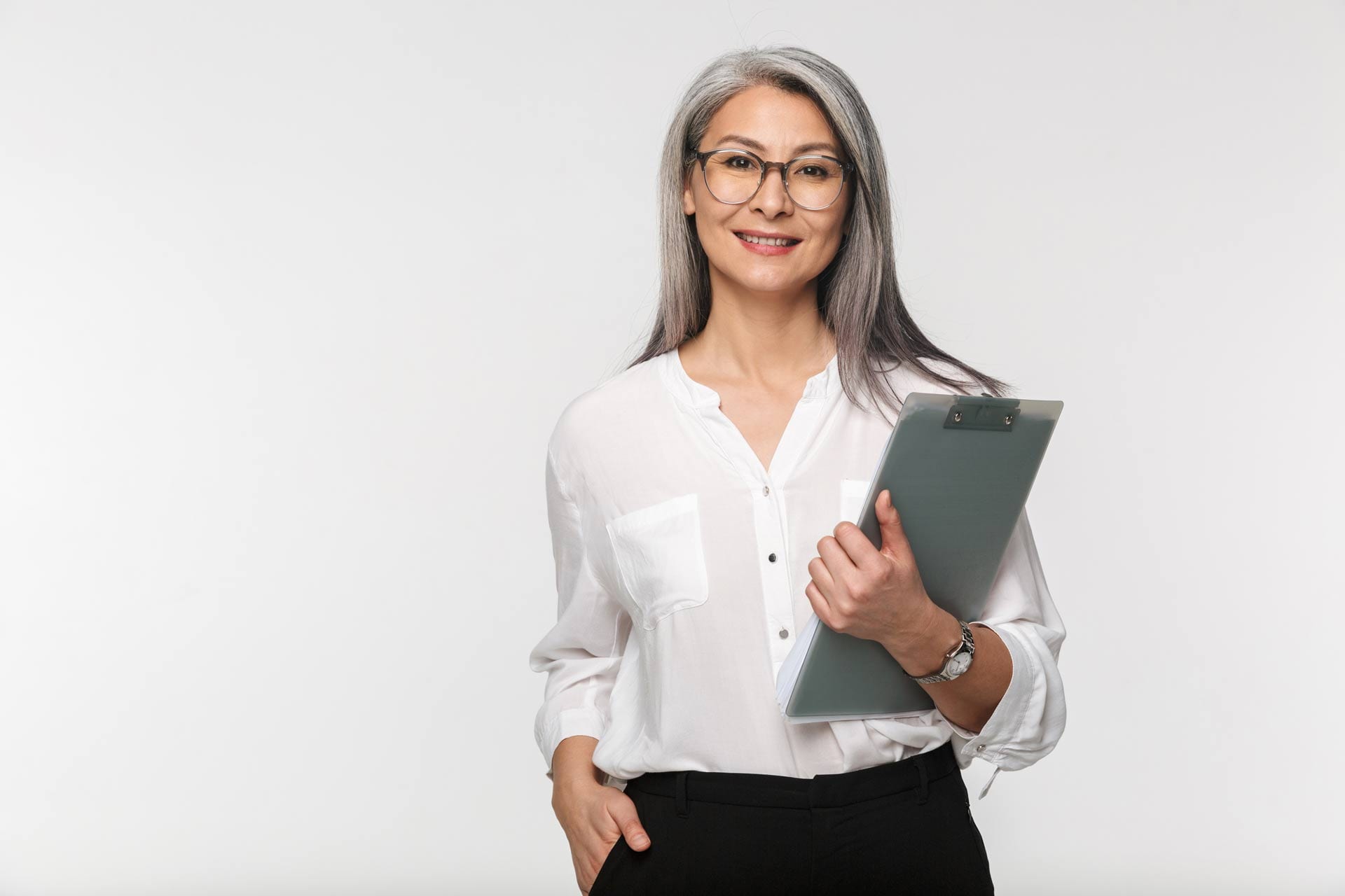 confident lady smiling with her new dental implants in Singapore