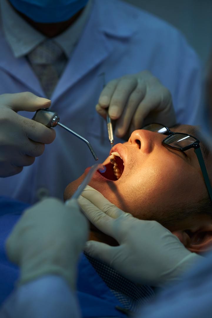 woman getting a dental filling in Singapore