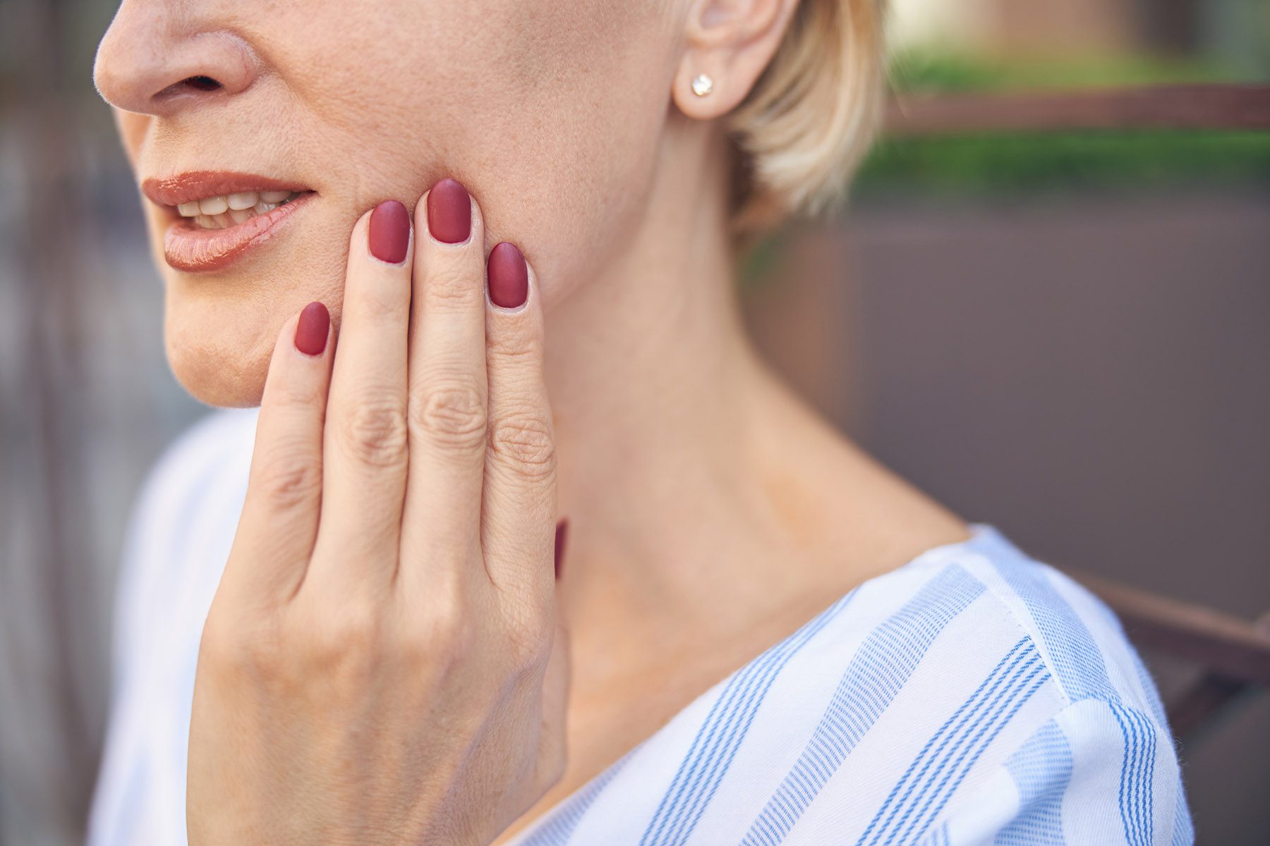 woman suffering from implant allergy