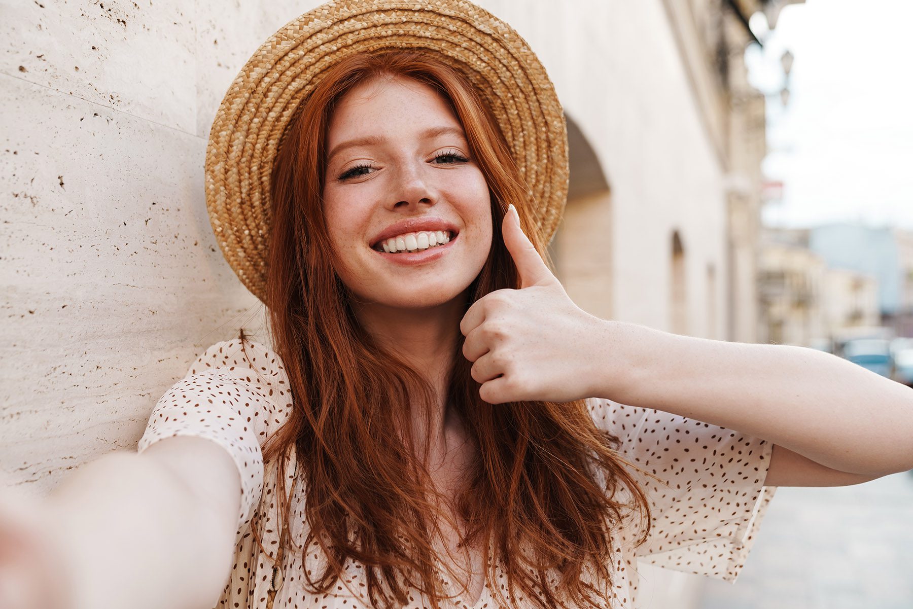 woman with thumbs up gesture woman with thumbs up gesture