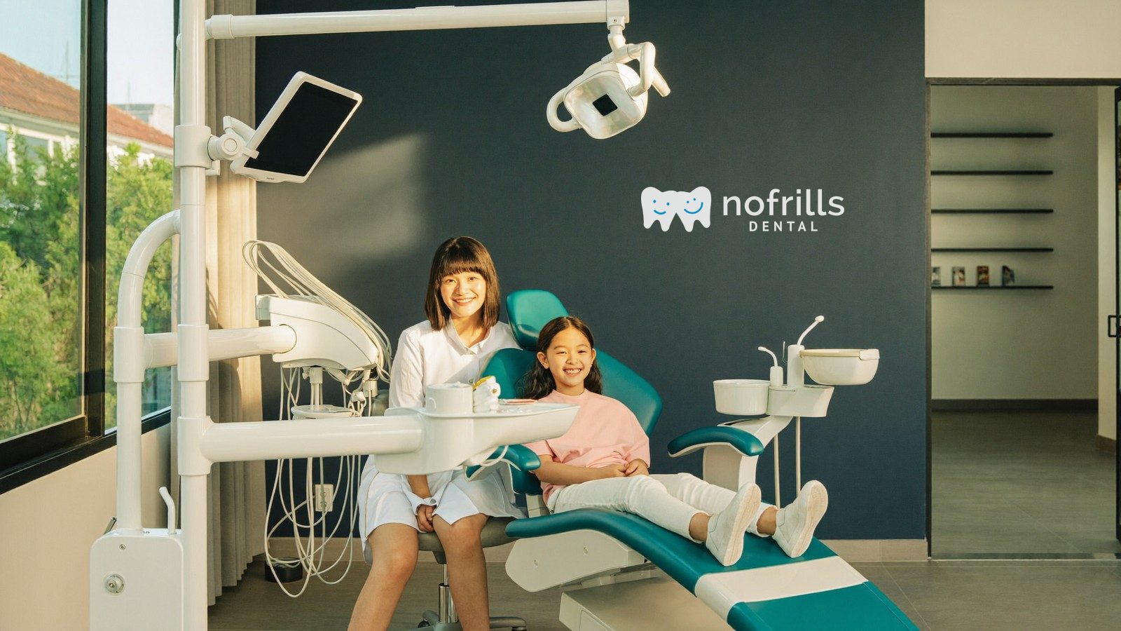 Mother and daughter at a Baby Bonus approved NoFrills Dental clinic in Singapore