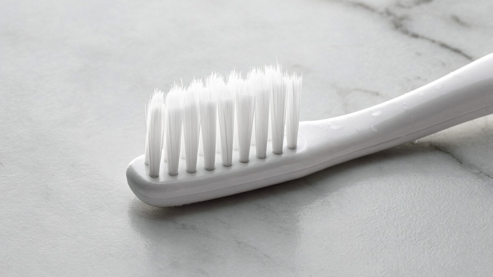 Close up of a soft bristle toothbrush, daily cleaning is what prevents gum disease