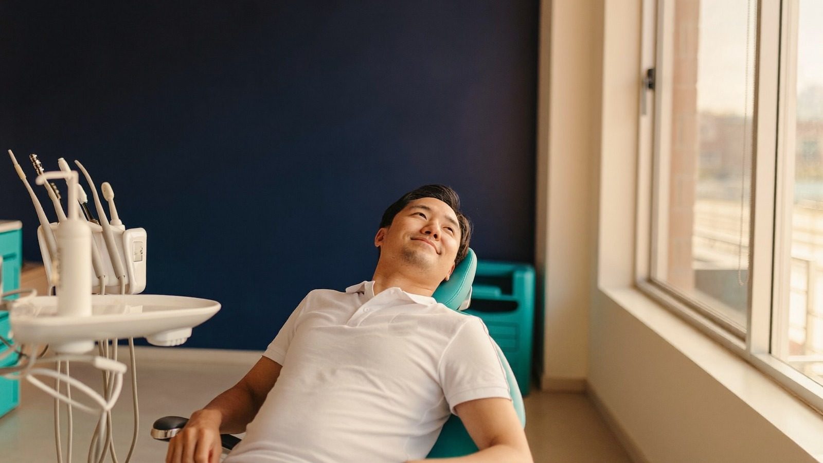 Patient at a Medisave accredited NoFrills Dental day surgery clinic in Singapore