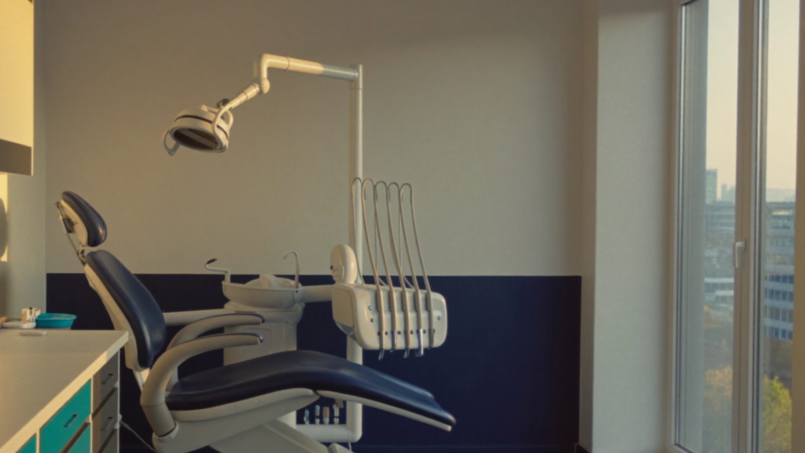 An empty treatment room at a NoFrills Dental clinic in Singapore, where a dental abscess is drained and the tooth treated the same day